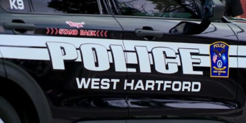 connecticut police officer shoots and kills carjacking suspect while trapped in stolen vehicle chief says