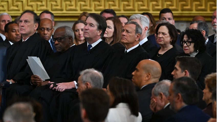 Justice Brett Kavanaugh and other Supreme Court Justices are seen attending the inaugural ceremonies for President Donald Trump