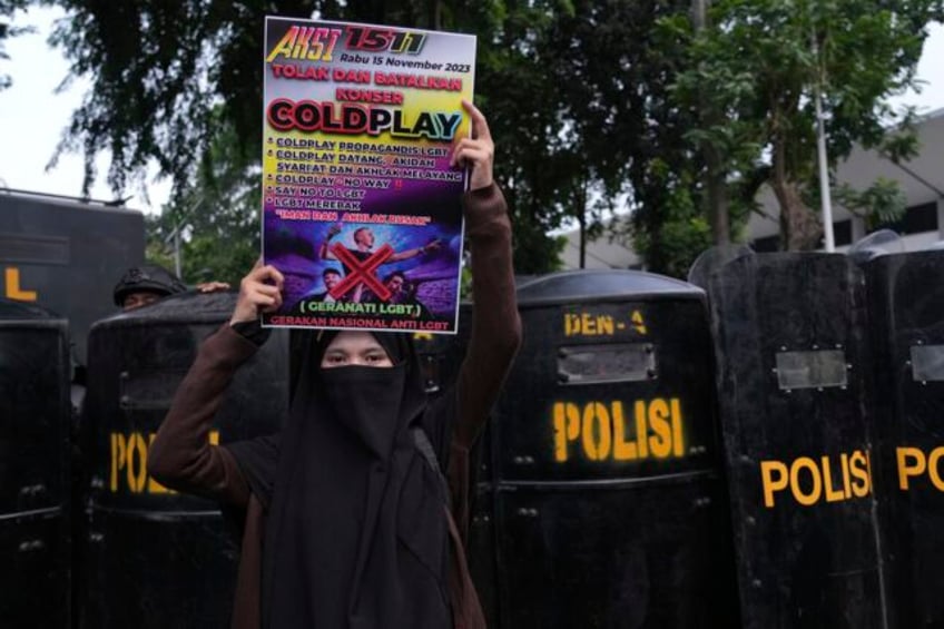 conservative muslims in indonesia protest coldplay concert over the bands lgbtq support