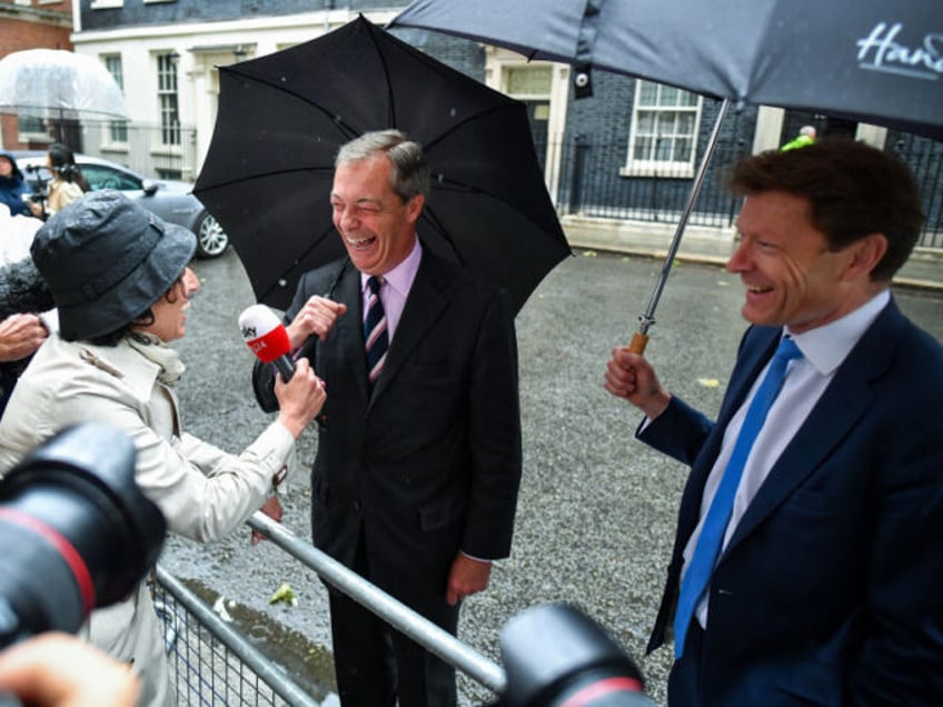 LONDON, ENGLAND - JUNE 07: Nigel Farage (L) and Richard Tice of the Brexit Party talk to t