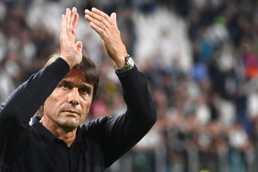 Napoli coach Antonio Conte says talk of regaining the Serie A title is premature