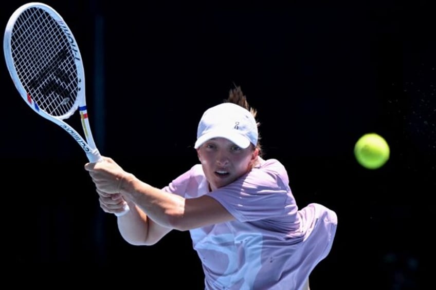 Iga Swiatek practises at Melbourne Park on Friday ahead of the Australian Open