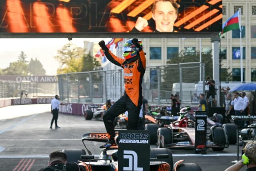 McLaren's Oscar Piastri celebrates a tense win on the streets of Baku