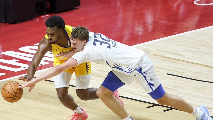 Bronny and Flagg going for ball