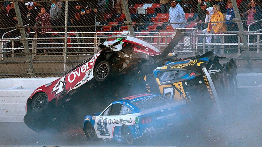 Three cars involved in a bad Talladega wreck