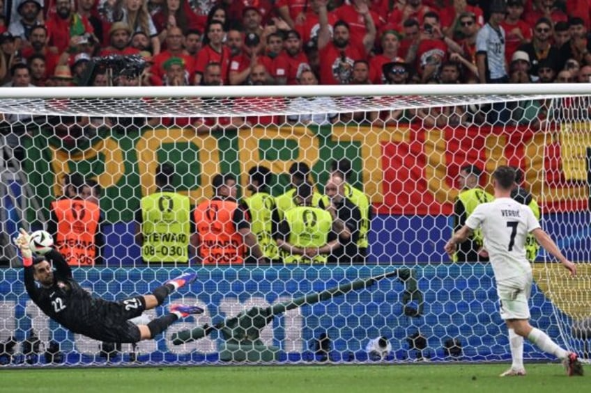 Portugal goalkeeper Diogo Costa made three penalty saves to send his team through to the E