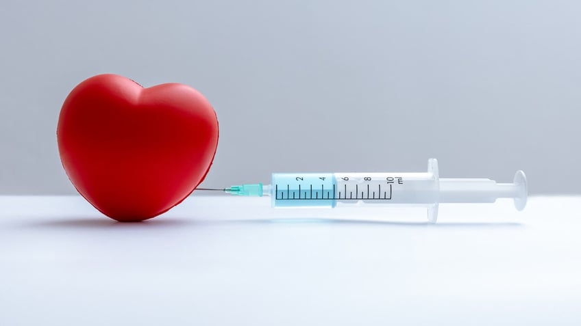 could flu vaccination reduce the risk of heart attacks and cardiovascular deaths