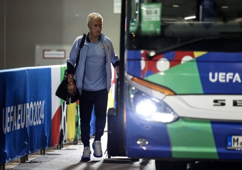 France coach Didier Deschamps boards the bus after his team's defeat by Spain in the Euro