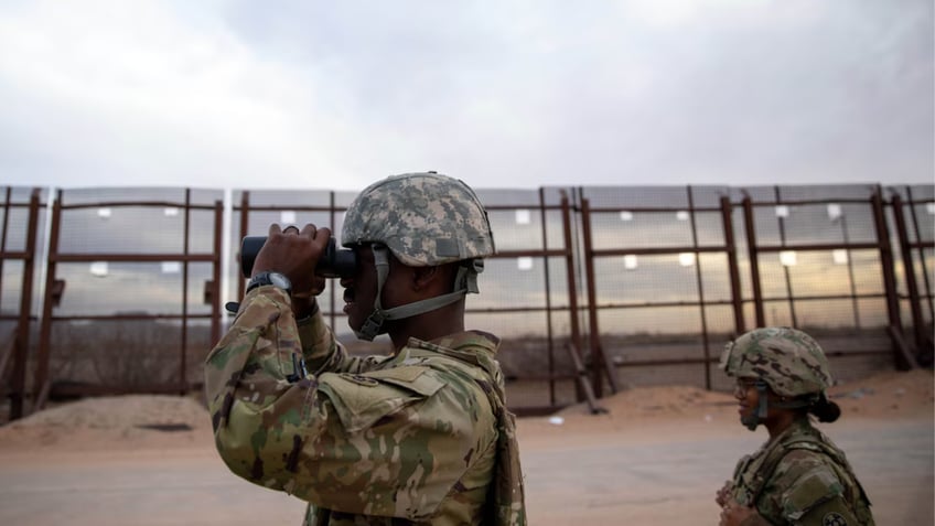 Soldiers keep watch near the southern border in New Mexico 