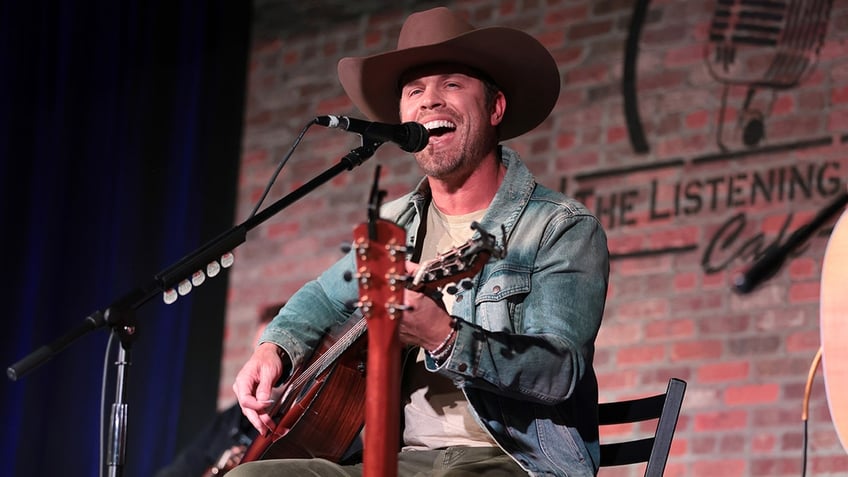 country singer dustin lynch admits luke bryan is the ultimate wingman