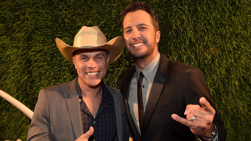 country singer dustin lynch admits luke bryan is the ultimate wingman