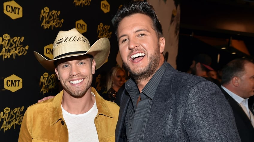 country singer dustin lynch admits luke bryan is the ultimate wingman