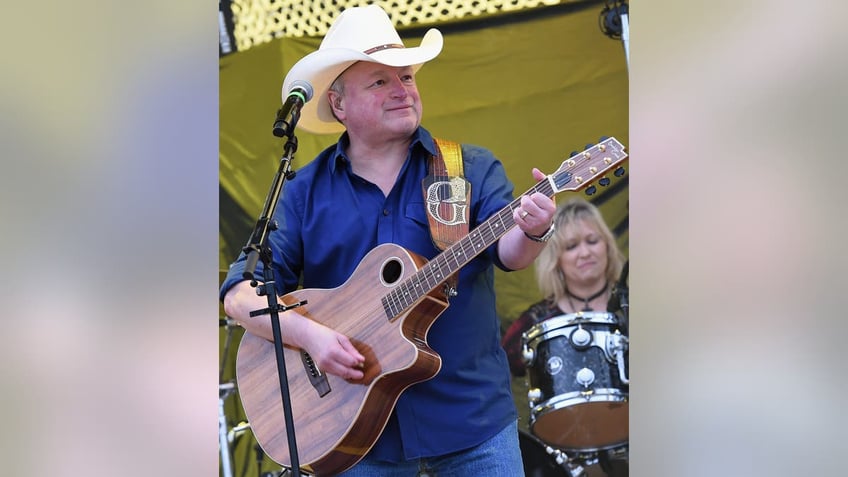 Mark Chesnutt performing on stage