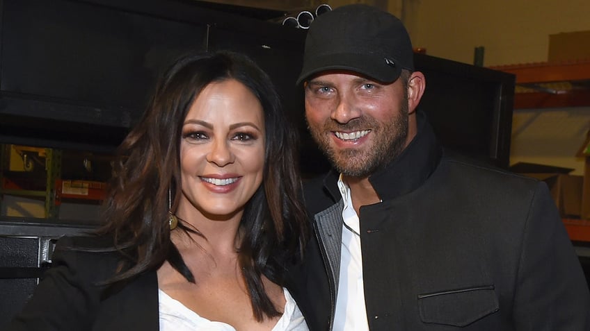 A photo of Sara Evans and Jay Barker