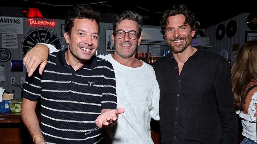 Jimmy Fallon, Jon Hamm and Bradley Cooper watch Jelly Roll perform in the hamptons.