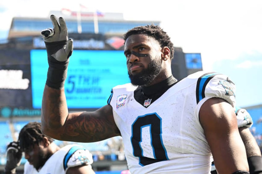 Brian Burns of the Carolina Panthers leaves the field after a loss against the Minnesota Vikings at Bank of America Stadium on October 01, 2023 in...