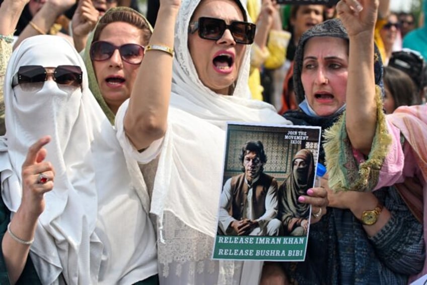 Supporters of former Pakistan prime minister Imran Khan protest outside an Islamabad court