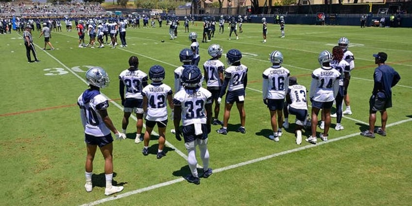 cowboys micah parsons appears to throw punch during melee at training camp practice