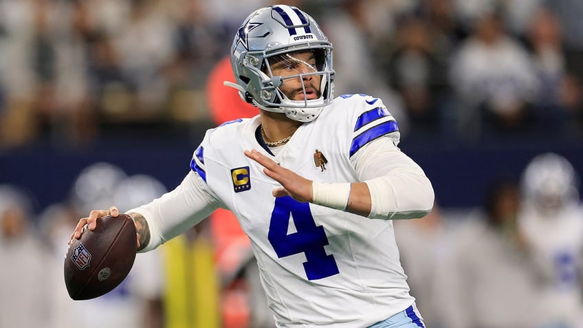 Dak Prescott drops back to pass