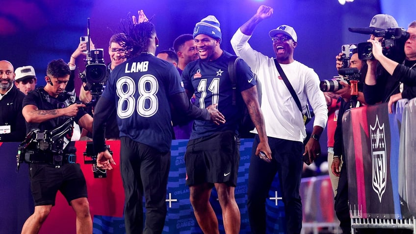 CeeDee Lamb and linebacker Micah Parsons celebrate