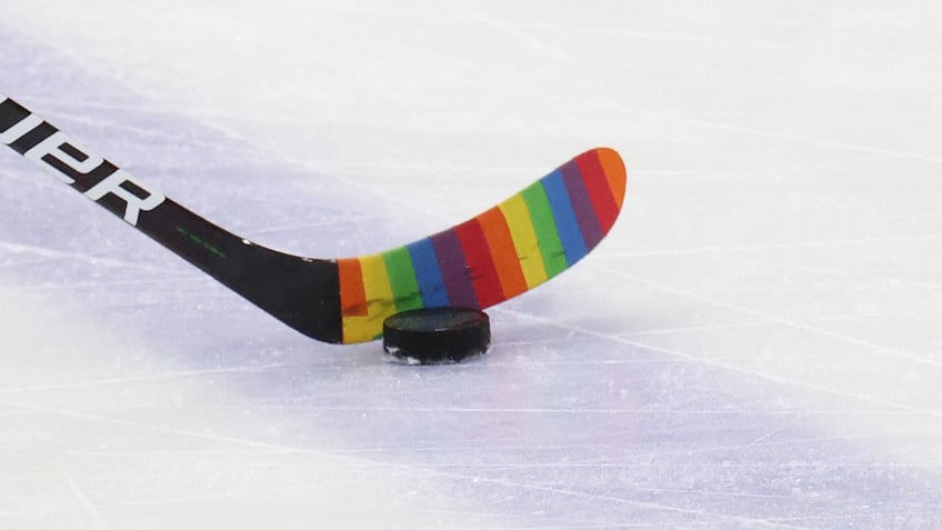 coyotes defenseman travis dermott uses pride tape in home opener becomes first player to defy nhl ban