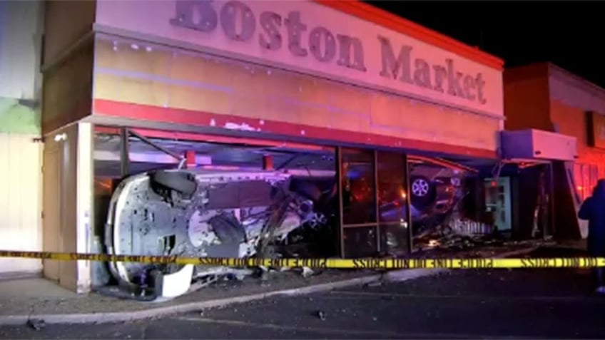 crash near boston leaves 2 cars wedged in front of former restaurant location with passengers trapped inside