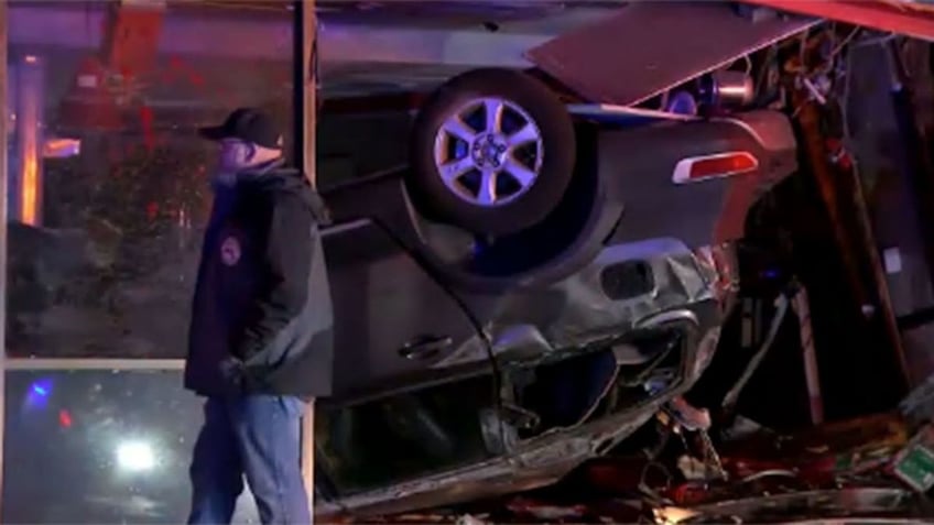 crash near boston leaves 2 cars wedged in front of former restaurant location with passengers trapped inside