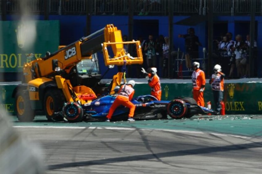 crash on first corner briefly halts brazil grand prix