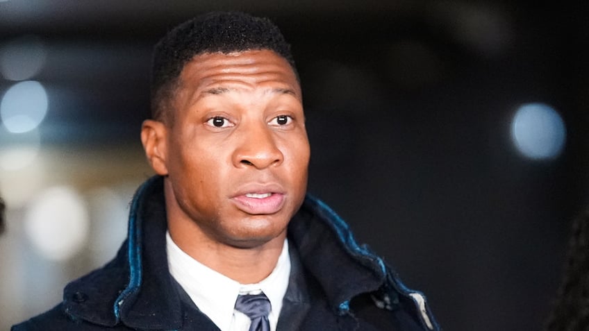 Jonathan Majors outside the courthouse