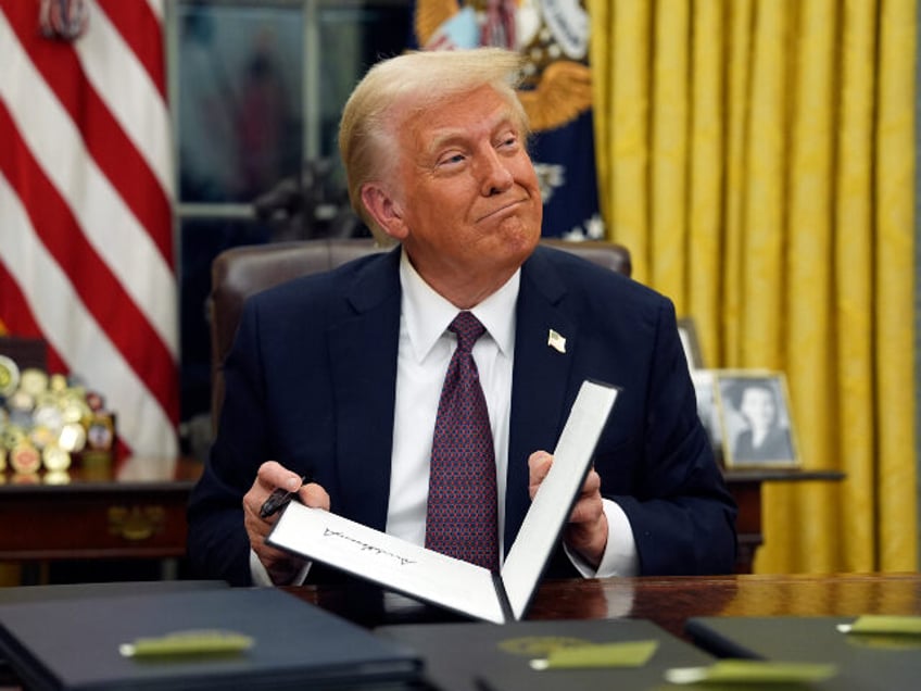 DEI - President Donald Trump signs executive orders in the Oval Office of the White House,