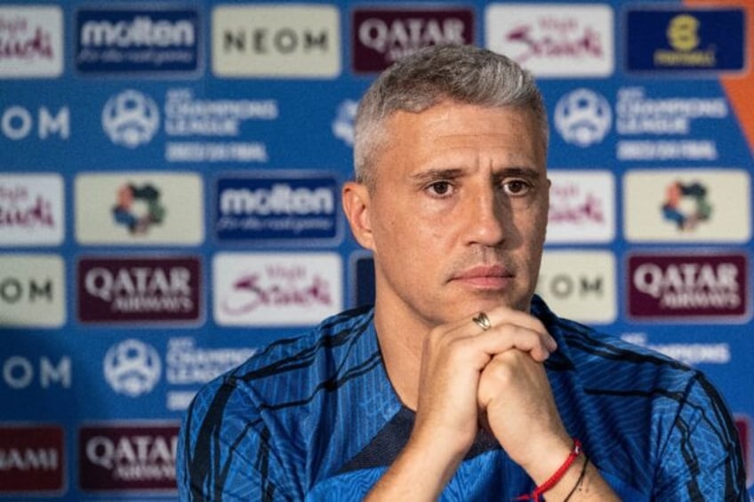 Al Ain coach Hernan Crespo of Argentina attends a news conference at Nissan Stadium before