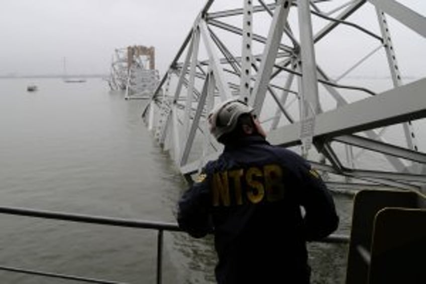 Crews begin 'complex process' of removing wrecked Baltimore bridge