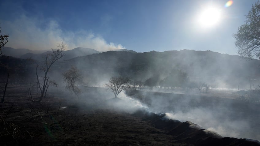 crews make modest headway against southern california wildfire