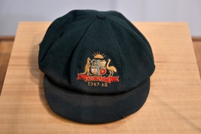 A "baggy green" cap worn by Australia cricket legend Don Bradman will go under the hammer