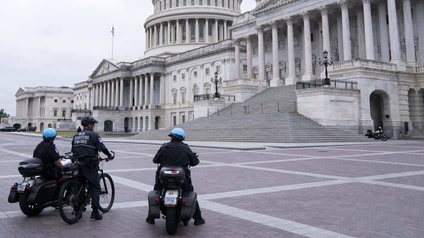 criminals who crashed stolen car into capitol barricade captured had automatic capable gun police