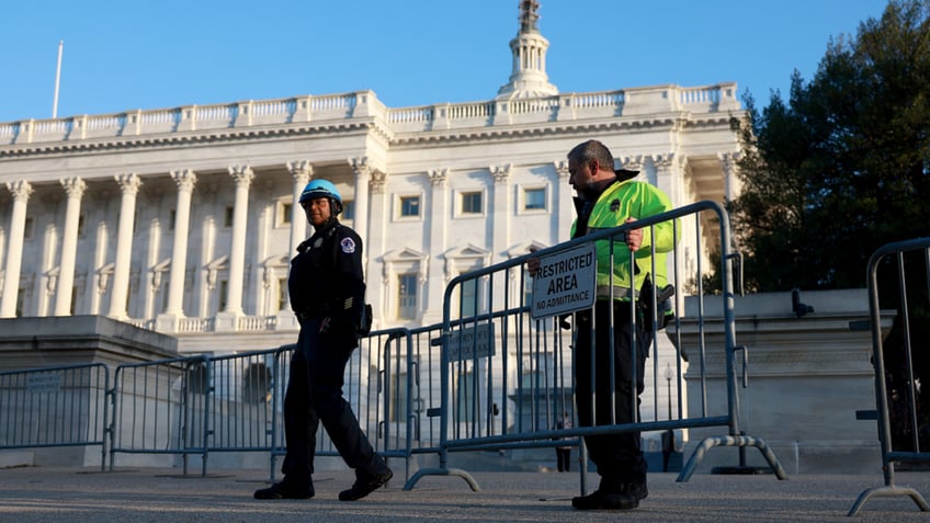 criminals who crashed stolen car into capitol barricade captured had automatic capable gun police