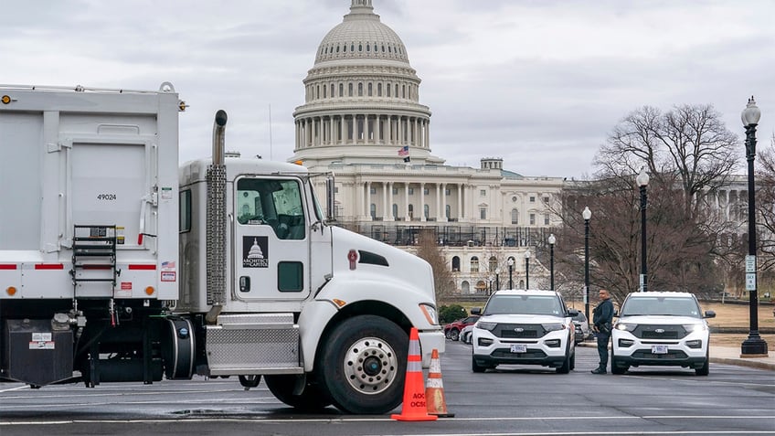 criminals who crashed stolen car into capitol barricade captured had automatic capable gun police