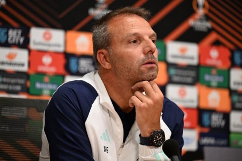 crisis hit ajax split with coach maurice steijn