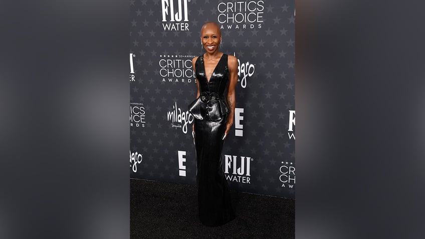 Cynthia Erivo, nominated for her role in "Wicked," wore a black leather gown with a plunging neckline.