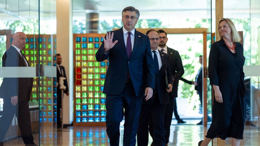 Andrej Plenkovic arrives at the Croatian presidential palace to meet President Zoran Milanovic
