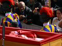 Crowds bid farewell to Pope Francis in first day of lying in state