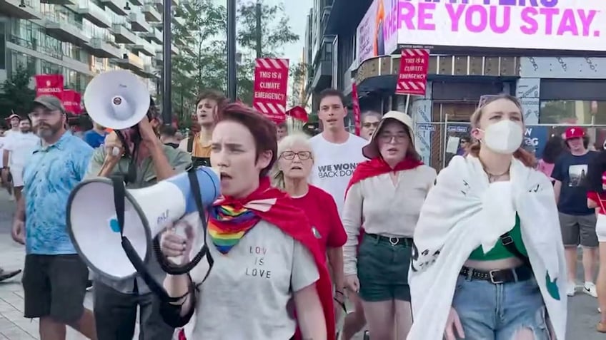 Climate protesters march