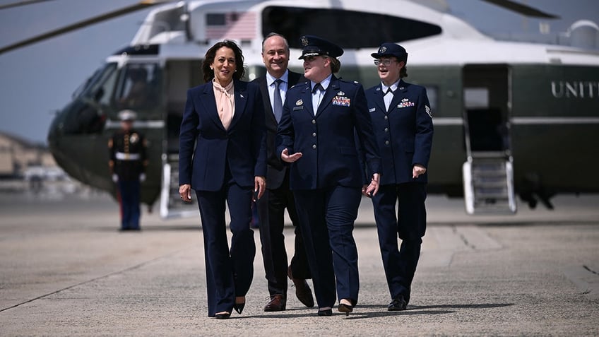 U.S. Vice President and Democratic presidential candidate Kamala Harris and Second Gentleman Doug Emhoff arrive to board Air Force Two