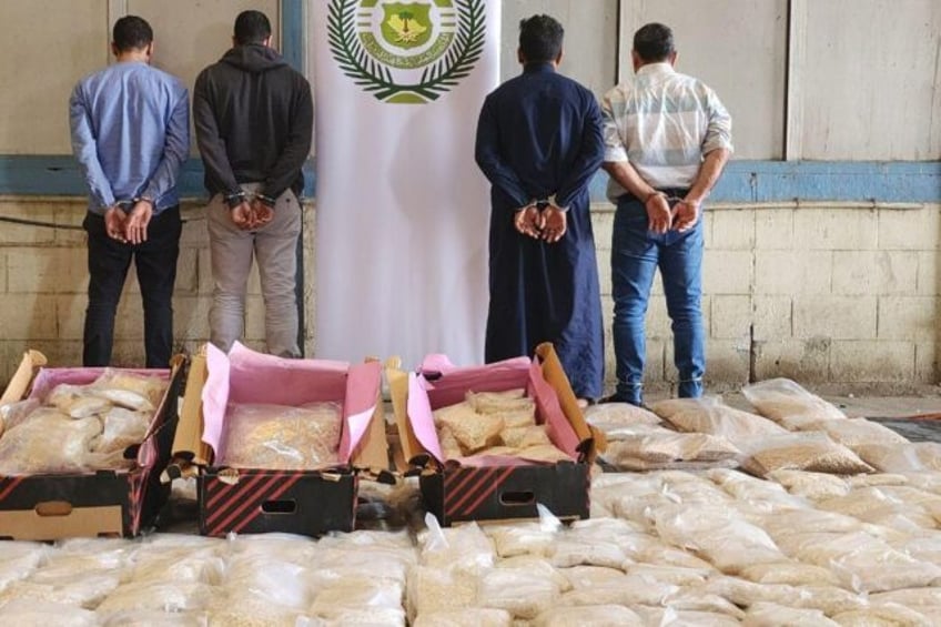 Saudi police make multiple arrests as they seize millions of amphetamine pills in a raid i