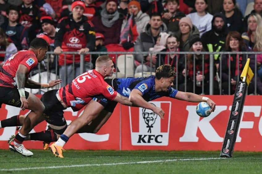 Blues winger AJ Lam scores a try but the Canterbury Crusaders fought back to score an upse