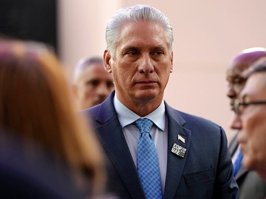 Cuba President Miguel Diaz-Canel walks through the COP28 U.N. Climate Summit, Saturday, De