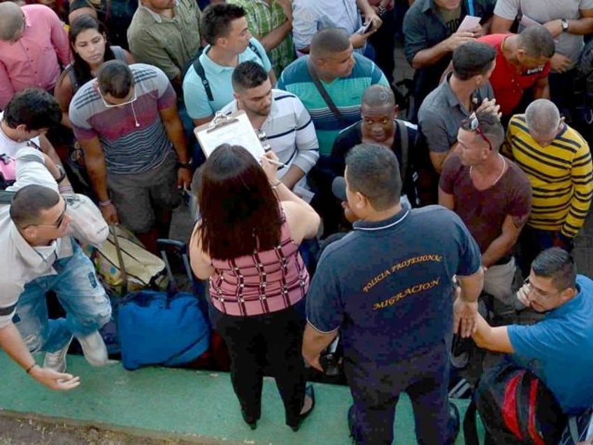 cuban woman indicted in fl for marriage fraud with 10 illegal immigrants