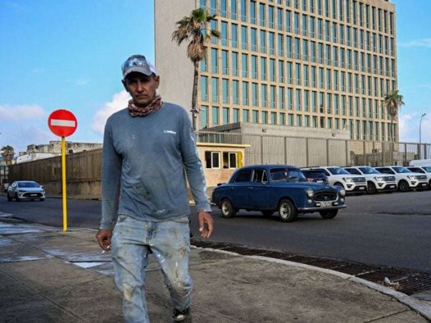 A man walks in front of the US embassy in Havana, on January 21, 2025. US President Donald