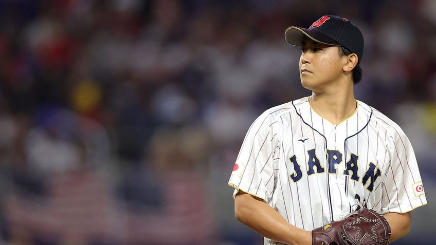 Shota Imanaga pitches during a game