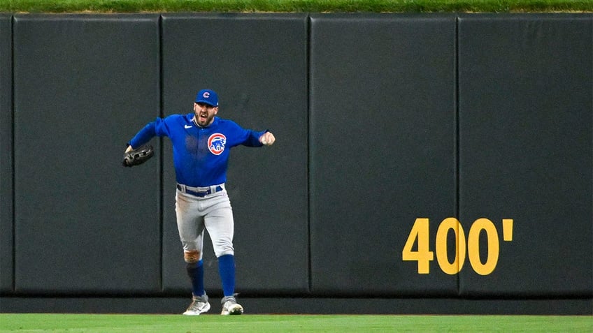 cubs outfielder robs cardinals of walk off home run for 7th straight win my goodness